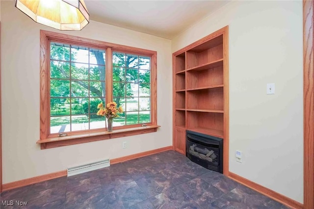 18373 Bentwood Dr, Doylestown, OH 44230 - spare room with a baseboard heating unit and baseboards