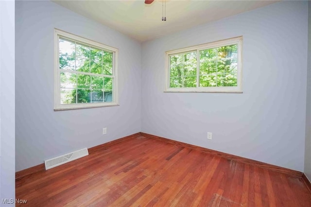 18373 Bentwood Dr, Doylestown, OH 44230 - spare room with plenty of natural light, baseboards, and wood finished floors