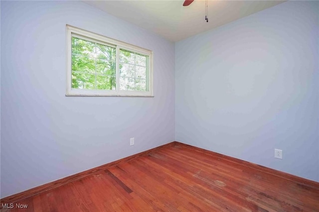 18373 Bentwood Dr, Doylestown, OH 44230 - empty room with wood finished floors and a ceiling fan