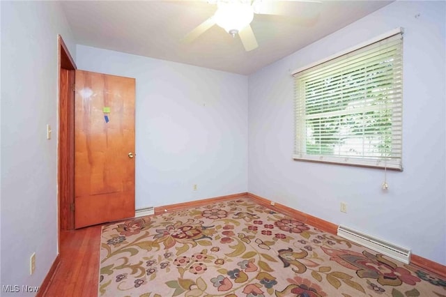 18373 Bentwood Dr, Doylestown, OH 44230 - unfurnished room featuring a ceiling fan, wood finished floors, and baseboards