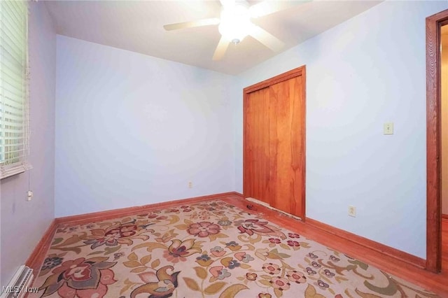 18373 Bentwood Dr, Doylestown, OH 44230 - empty room featuring ceiling fan, wood finished floors, and baseboards