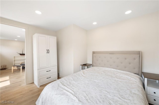 472 Saunders Ave, Coventry, OH 44319 - bedroom with light wood-style flooring and recessed lighting