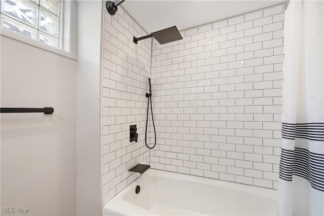 472 Saunders Ave, Coventry, OH 44319 - bathroom with shower / bath combo with shower curtain