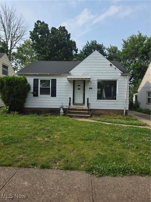 3801 Archmere Ave, Old Brooklyn, OH 44109 - bungalow-style house with a front lawn, entry steps, and roof with shingles