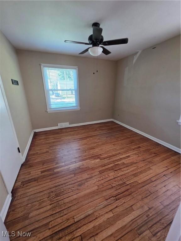 3801 Archmere Ave, Old Brooklyn, OH 44109 - spare room with wood finished floors, a ceiling fan, and baseboards