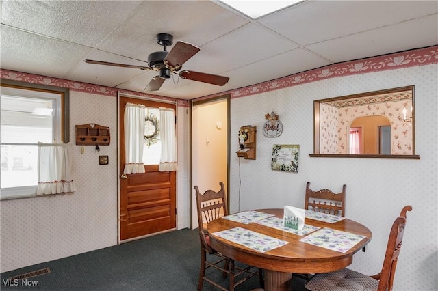 1303 28th St, Vienna, WV 26105 - dining area featuring ceiling fan and carpet