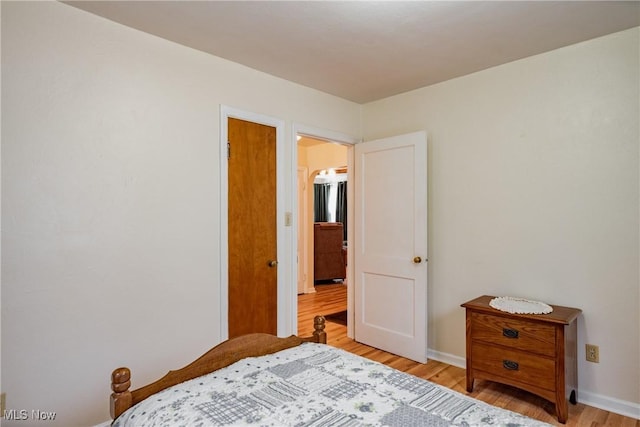 1303 28th St, Vienna, WV 26105 - bedroom featuring light wood-style flooring and baseboards