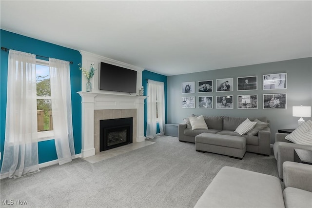 189 Booth Bay Dr, Medina, OH 44256 - living room with carpet flooring, a tile fireplace, and baseboards