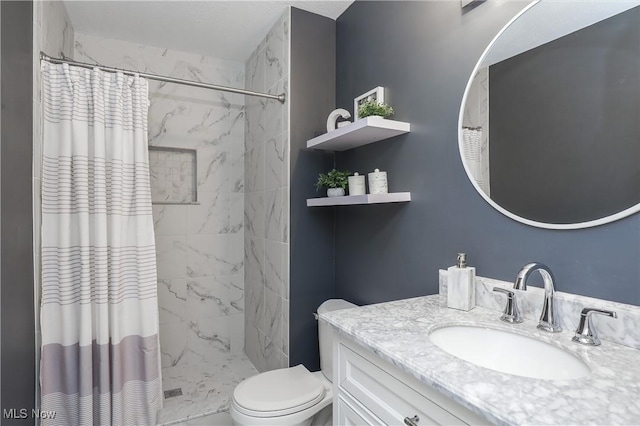 189 Booth Bay Dr, Medina, OH 44256 - full bathroom featuring toilet, a tile shower, and vanity