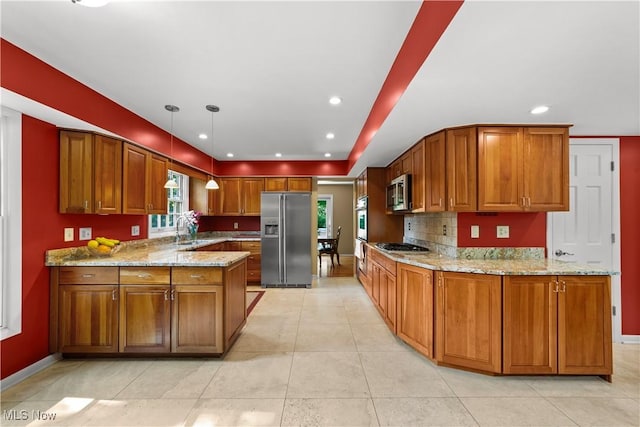 177 N Park Dr, Aurora, OH 44202 - kitchen with appliances with stainless steel finishes, brown cabinets, light stone countertops, and recessed lighting