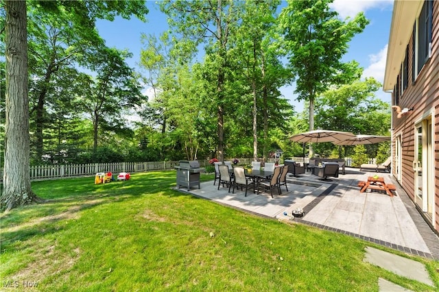 177 N Park Dr, Aurora, OH 44202 - fenced backyard with a patio, view of wooded area, and an outdoor hangout area