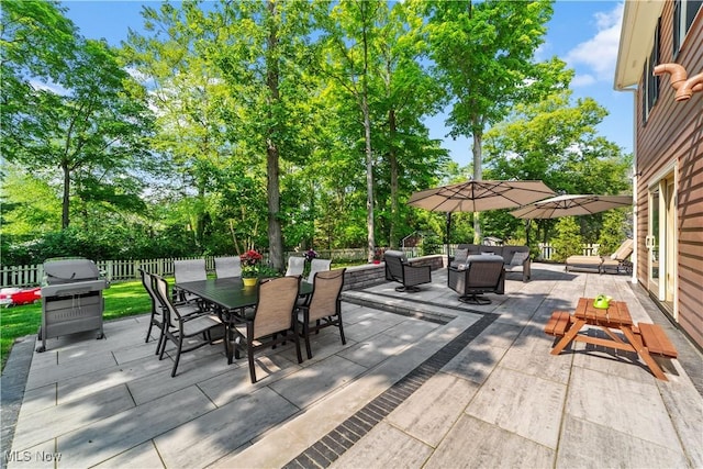 177 N Park Dr, Aurora, OH 44202 - view of patio / terrace with an outdoor living space, outdoor dining space, area for grilling, and view of wooded area
