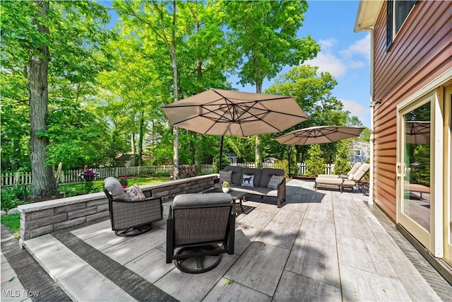 177 N Park Dr, Aurora, OH 44202 - wooden deck with an outdoor hangout area, a fenced backyard, and a patio area