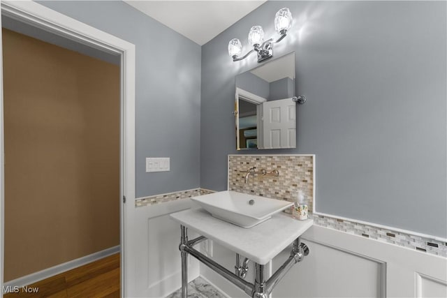 177 N Park Dr, Aurora, OH 44202 - bathroom featuring tasteful backsplash and wood finished floors