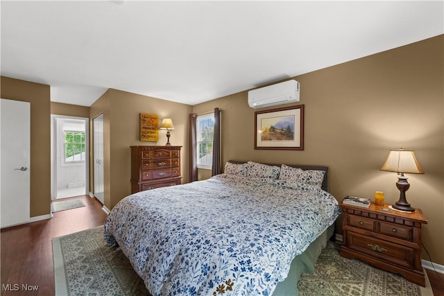 177 N Park Dr, Aurora, OH 44202 - bedroom featuring a wall mounted air conditioner, wood finished floors, and a closet