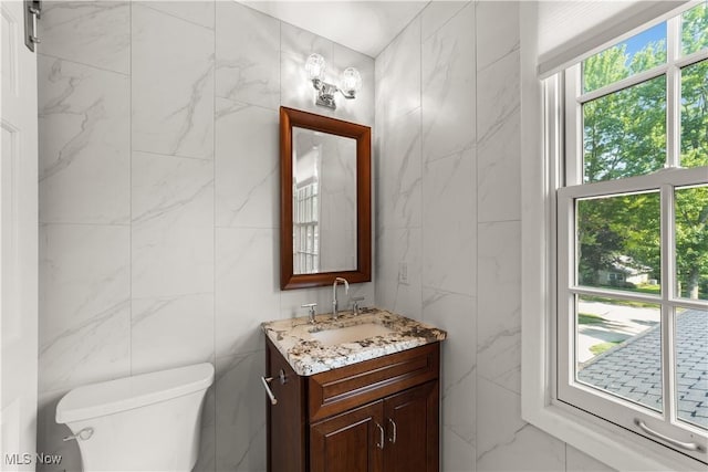 177 N Park Dr, Aurora, OH 44202 - half bathroom with tile walls and vanity