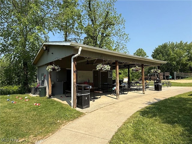 177 N Park Dr, Aurora, OH 44202 - surrounding community with a lawn and a patio area