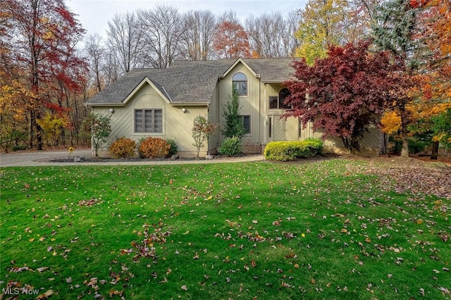 30965 Woodall, Solon, OH 44139 - view of front of home featuring a front lawn and roof with shingles