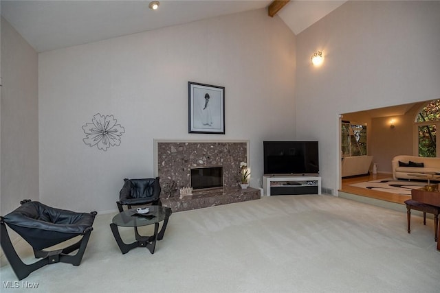 30965 Woodall, Solon, OH 44139 - living room featuring beamed ceiling, high vaulted ceiling, carpet, and a fireplace