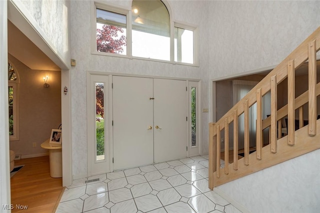 30965 Woodall, Solon, OH 44139 - entrance foyer featuring wallpapered walls and a towering ceiling