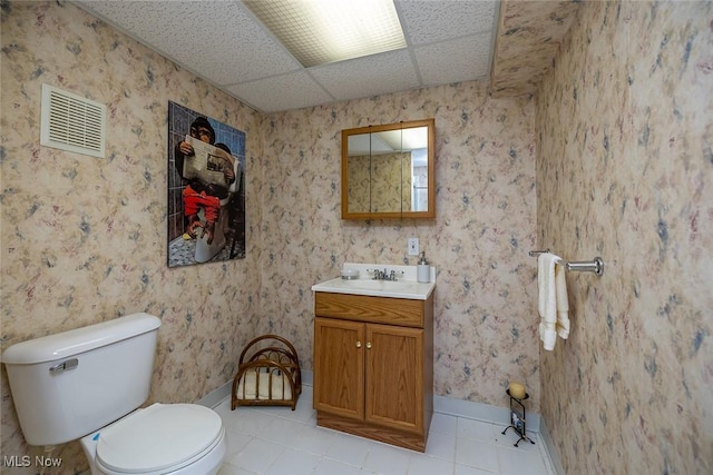 30965 Woodall, Solon, OH 44139 - half bathroom featuring vanity, toilet, tile patterned floors, baseboards, and wallpapered walls