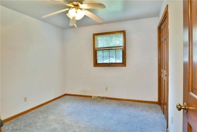 6739 Stewart Sharon Rd, Brookfield, OH 44403 - carpeted empty room with a ceiling fan and baseboards