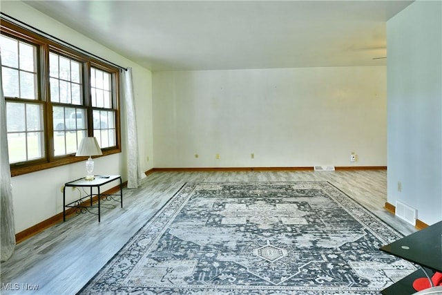 6739 Stewart Sharon Rd, Brookfield, OH 44403 - spare room featuring wood finished floors and baseboards