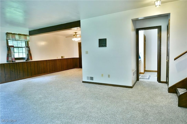 6739 Stewart Sharon Rd, Brookfield, OH 44403 - carpeted spare room with a ceiling fan, baseboards, and stairway