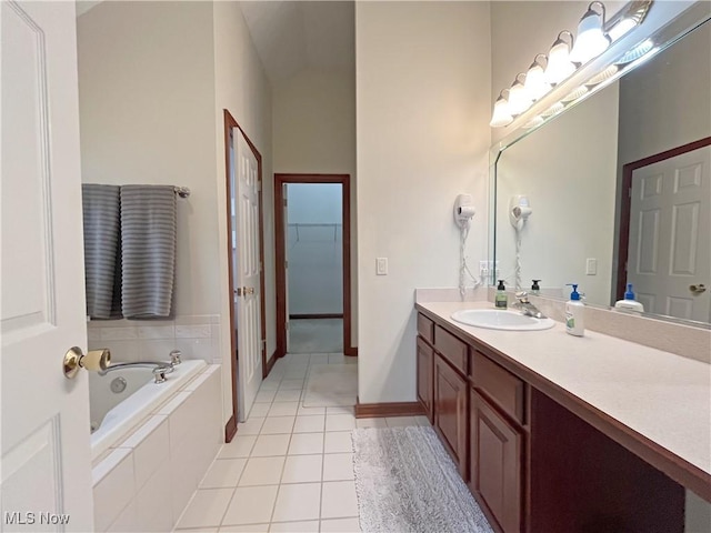 6005 Champagne, Medina, OH 44256 - bathroom with vanity, a garden tub, tile patterned flooring, a closet, and baseboards