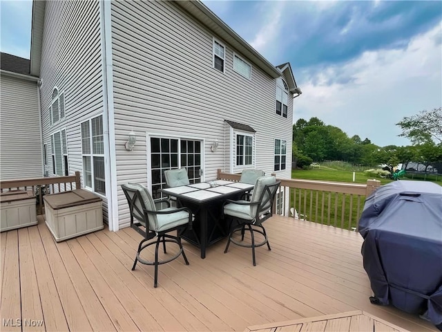 6005 Champagne, Medina, OH 44256 - wooden deck featuring outdoor dining space