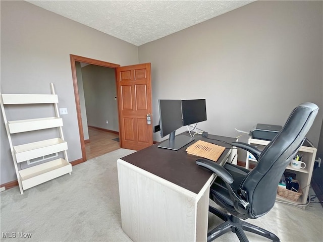6005 Champagne, Medina, OH 44256 - carpeted home office featuring a textured ceiling and baseboards