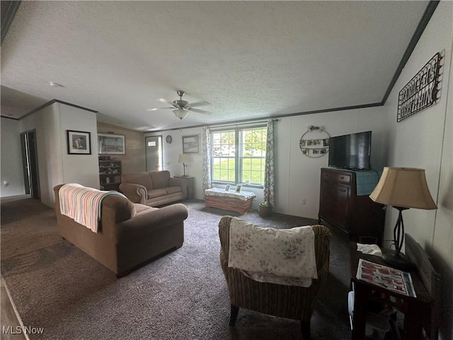 301 46th St SW, Canton, OH 44706 - living room featuring a textured ceiling, carpet, a ceiling fan, and crown molding