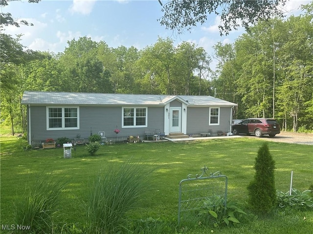 301 46th St SW, Canton, OH 44706 - view of front facade with entry steps and a front lawn