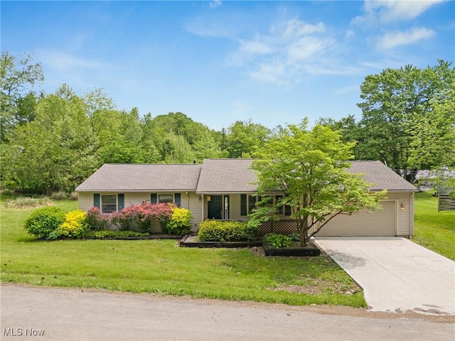 7183 Hunter Dr, Chippewa Lake, OH 44215 - ranch-style house featuring an attached garage, a front lawn, and driveway