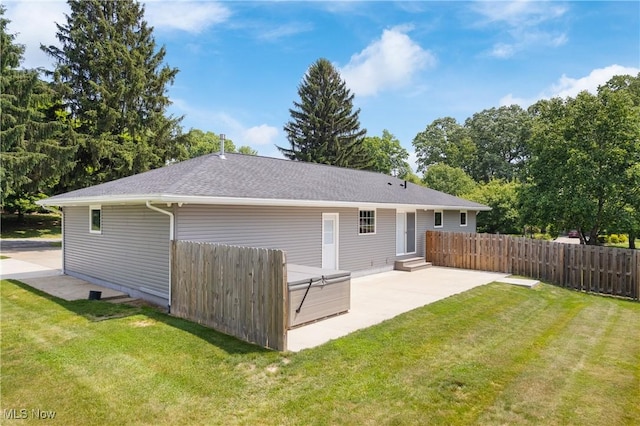 1892 Toepfer Rd, Akron, OH 44312 - back of property with a patio area and entry steps