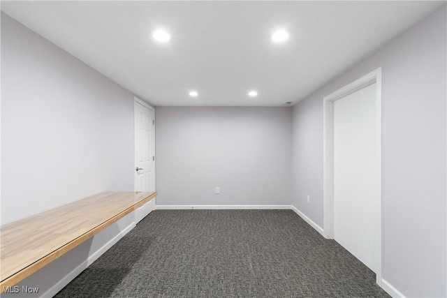 1892 Toepfer Rd, Akron, OH 44312 - empty room with recessed lighting, dark colored carpet, and baseboards