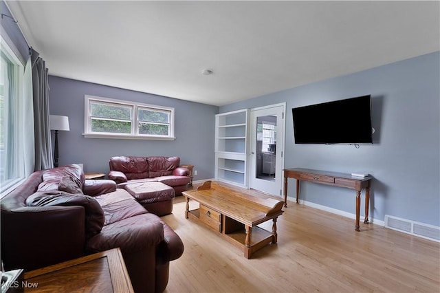 1094 Jessie Ave, Kent, OH 44240 - living room with light wood-style floors and baseboards