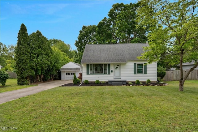 1094 Jessie Ave, Kent, OH 44240 - view of front facade with a garage, an outdoor structure, roof with shingles, and driveway