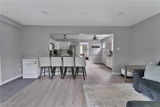 1094 Jessie Ave, Kent, OH 44240 - living room featuring wood finished floors and baseboards