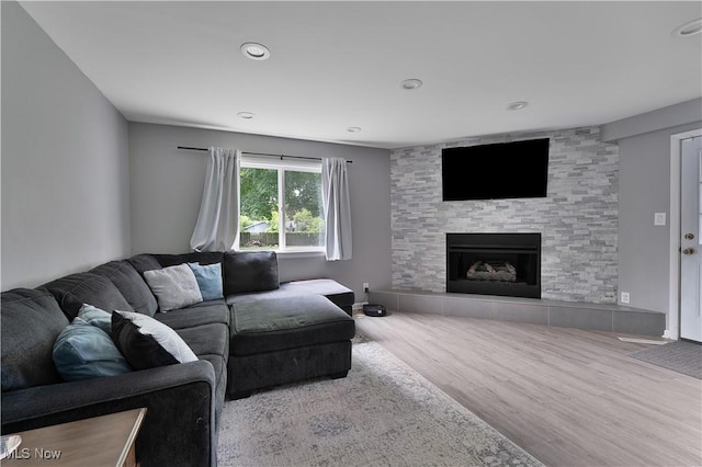 1094 Jessie Ave, Kent, OH 44240 - living room featuring wood finished floors and a fireplace