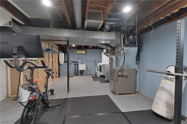1094 Jessie Ave, Kent, OH 44240 - unfinished below grade area with heating unit, a sink, and concrete block wall