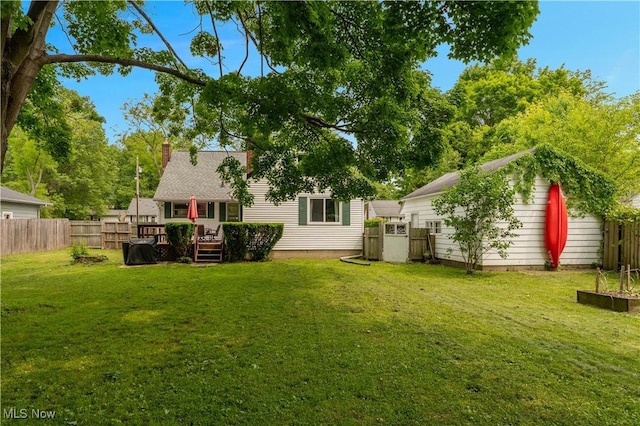1094 Jessie Ave, Kent, OH 44240 - view of yard featuring a wooden deck and an outbuilding