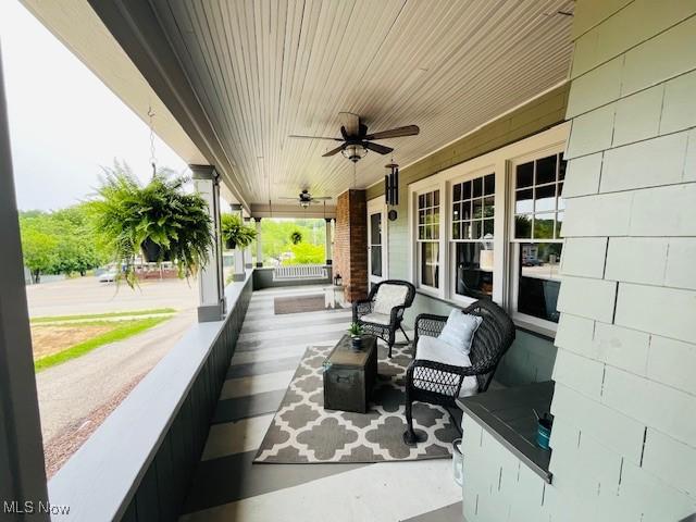 161 W Main St, New Concord, OH 43762 - porch with ceiling fan