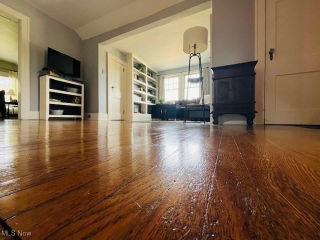 161 W Main St, New Concord, OH 43762 - living area featuring hardwood / wood-style floors and built in features