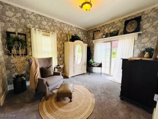 161 W Main St, New Concord, OH 43762 - living area with carpet floors, wallpapered walls, and crown molding