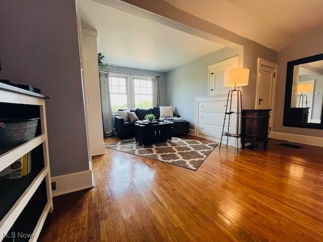 161 W Main St, New Concord, OH 43762 - living area with wood finished floors and baseboards