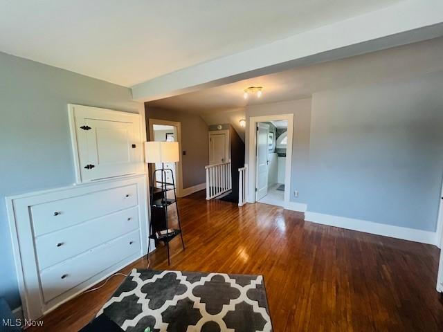 161 W Main St, New Concord, OH 43762 - bedroom with baseboards and wood finished floors