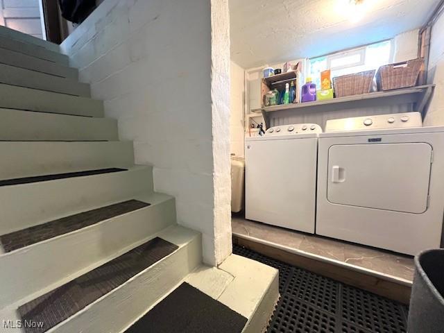 161 W Main St, New Concord, OH 43762 - laundry room featuring washing machine and clothes dryer