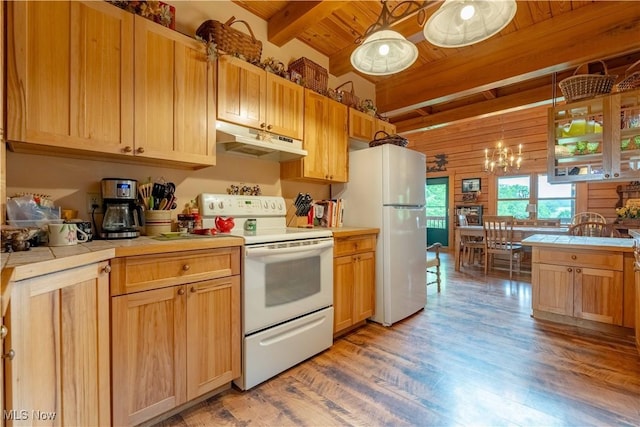 6165 Tyro St NE, Louisville, OH 44641 - kitchen with under cabinet range hood, white appliances, tile countertops, light wood-style floors, and wooden ceiling with exposed beams