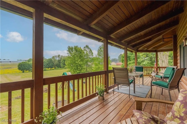 6165 Tyro St NE, Louisville, OH 44641 - wooden deck featuring a lawn